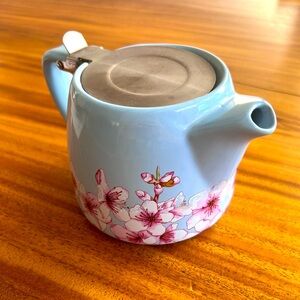 Floral teapot with brew basket. 20 ounces Never been used